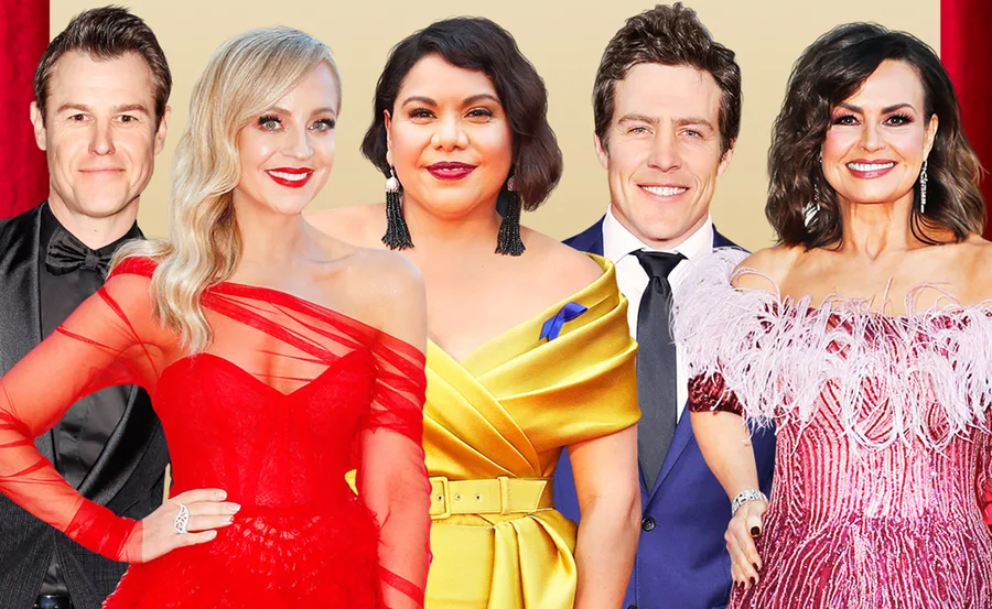Group of celebrities dressed for a red carpet event in elegant attire, smiling at the camera.