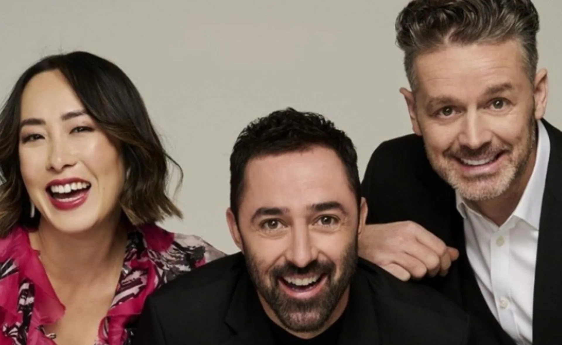 Three smiling judges from MasterChef Fans and Favourites 2022 posing together.