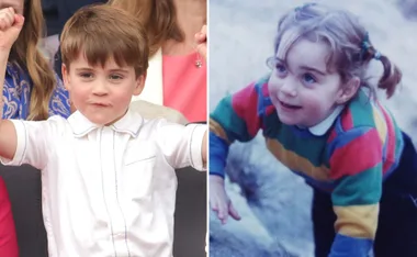 Child in white shirt with hands raised next to another child in a colorful sweater crouching outside.