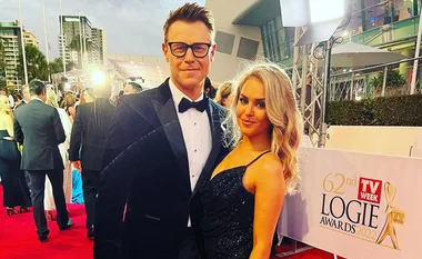 Couple dressed elegantly on red carpet at 62nd TV Week Logie Awards, 2022.