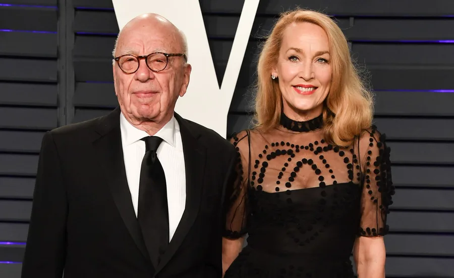 Rupert Murdoch and Jerry Hall at an event, both elegantly dressed and smiling.
