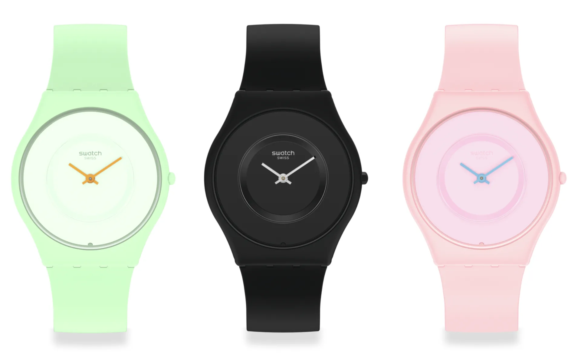 Three Swatch Skin Bioceramic watches in mint green, black, and pink.