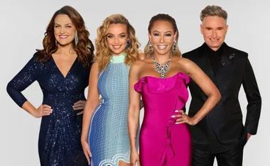 Four judges from "The Masked Singer Australia" pose together in formal attire against a neutral background.