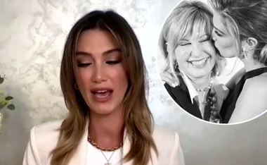 Delta Goodrem speaks, inset shows her kissing Olivia Newton-John in a black-and-white photo.