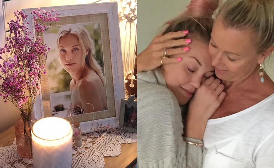 A framed photo with flowers and candle, next to a touching embrace between two women, one with pink nails.