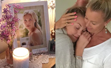 A framed photo with flowers and candle, next to a touching embrace between two women, one with pink nails.