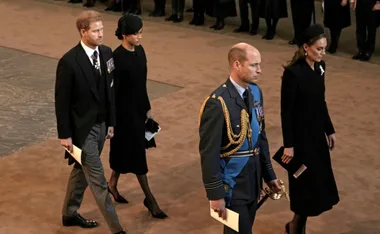 Prince Harry and Meghan Markle reunite with the British royal family to receive the Queen’s coffin