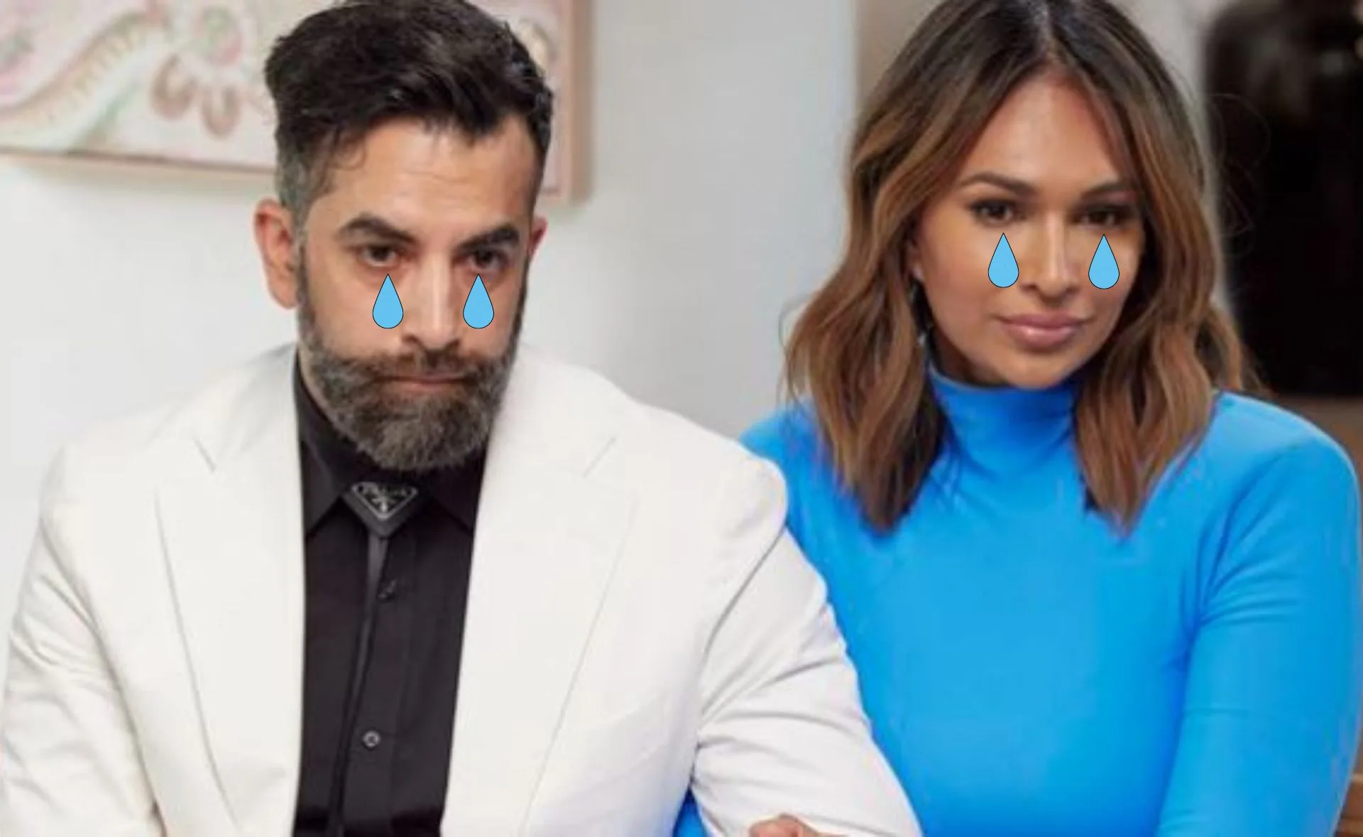 A man and a woman with sad emoji tears, sitting side by side.