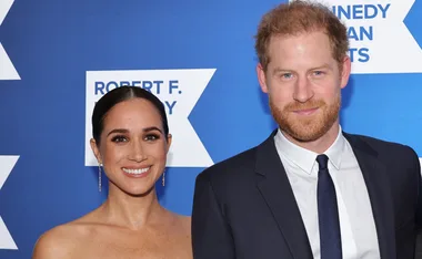 Meghan Markle and Prince Harry strut the blue carpet with Princess Di’s heirloom