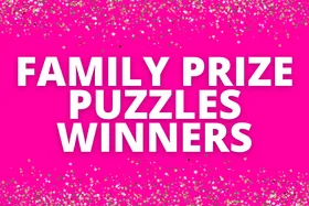 "Bright pink background with text 'Family Prize Puzzles Winners' surrounded by gold and silver sparkles."