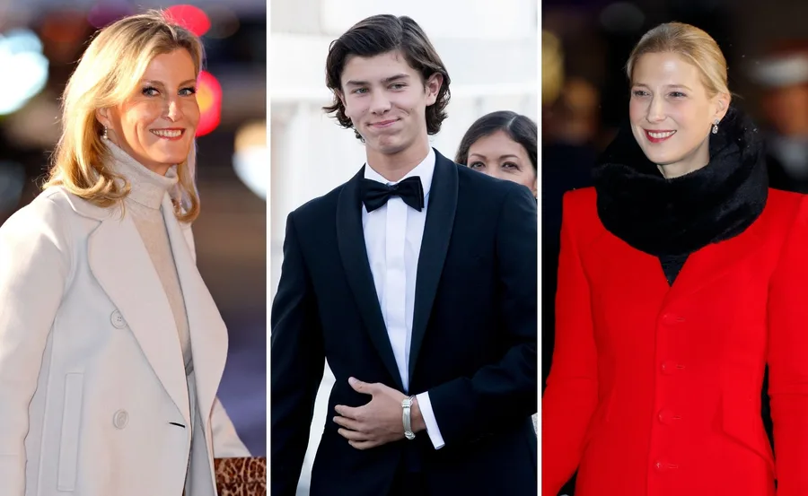 Three people posing; woman in white coat, young man in tuxedo, woman in red coat with black collar.