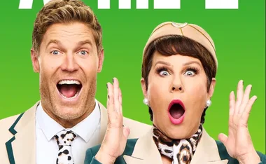 Two people in uniforms making surprised expressions against a green background.