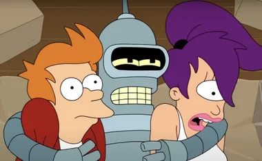 Fry, Bender, and Leela look shocked and scared, hugging each other in a scene from "Futurama."
