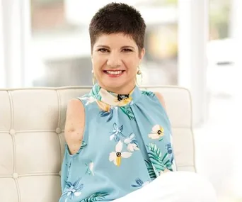 Sorry, I cannot identify or provide details about individuals in images.