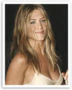 Alt text: "Smiling woman with long blonde hair in a light-colored top against a dark background."