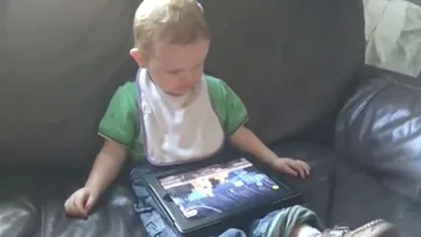 Kids do the cutest things: Little boy reacts to Angry Birds