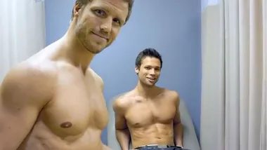 Bare-chested men promote breast cancer self-checks