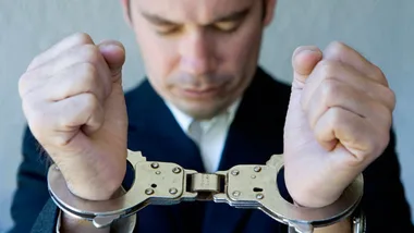 Man hand-cuffed