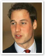 A man in a suit and tie, looking to the side, with short hair and a neutral expression.