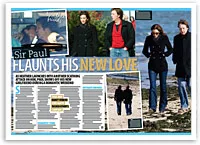 Paul walking on a beach with a woman, both in casual attire, suggesting a peaceful and intimate moment.