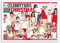 Group of children dressed in red and white for a festive Christmas-themed photo shoot, smiling and posing together.
