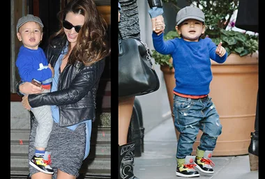 A woman in sunglasses holds a toddler wearing a cap and blue sweater. The toddler walks holding a hand in the second image.