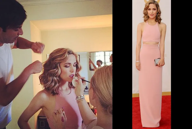 Alt text: Woman getting makeup and hair done and posing in a pink dress on the red carpet.