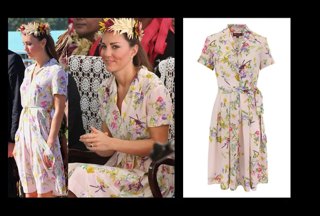 Floral dress with short sleeves, worn by a woman with a floral headband, seated outdoors.