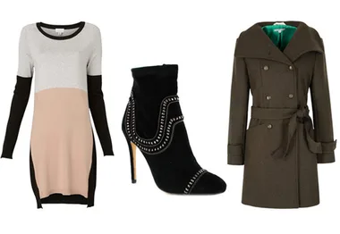 Color-block sweater dress, studded black ankle boots, and a double-breasted olive coat for winter fashion.