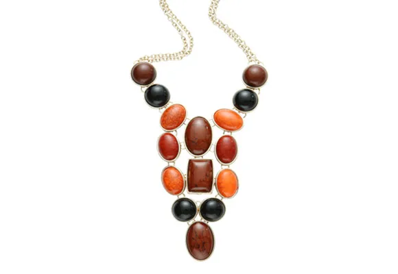 Necklace with red, brown, and black stones in a symmetrical pattern on a silver chain.