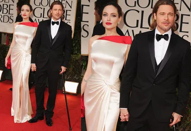 "Formal couple on Golden Globe 2012 red carpet; woman in white gown, man in black suit with cane."