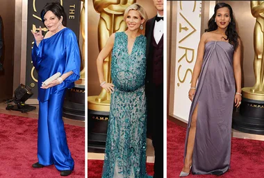 Three women at the 2014 Oscars, wearing vibrant gowns. One in blue, one in teal with lace, and one in a strapless grey dress.