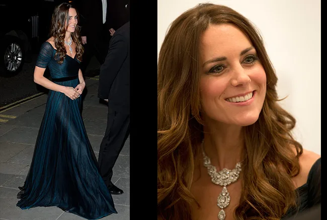 Kate Middleton at 2014 charity gala, wearing a deep teal gown with an intricate diamond necklace and earrings set.