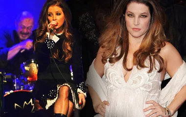 Lisa Marie Presley performing on stage, wearing a black outfit, and posing confidently in a white dress.