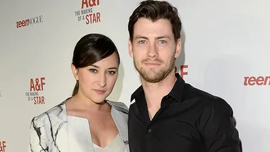 A man and woman at a Teen Vogue event, posing for a photo together.