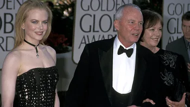 Nicole Kidman with her parents at the Golden Globe Awards, her father in a tuxedo and mother in a black dress.