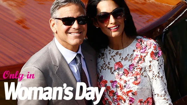 Two individuals smiling, wearing sunglasses; one in a suit and the other in a floral dress, featured in Woman's Day.