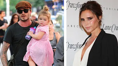 A man holds a toddler in a pink dress; a woman stands in a white top and black jacket.