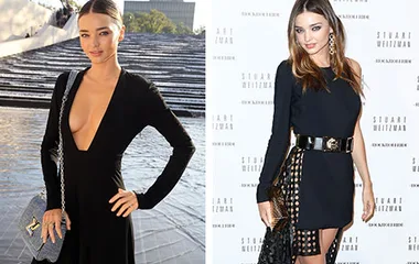 Miranda Kerr in a chic black dress with deep neckline and designer handbag at a fashion event in Paris.