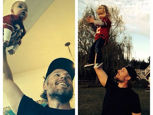 Man lifting a baby indoors and same man lifting a toddler outdoors, both wearing similar sports jerseys, smiling.