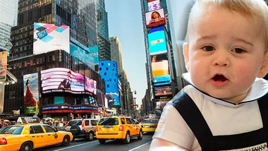 Baby in a black and white outfit superimposed over a busy Times Square street scene with taxis and bright billboards.
