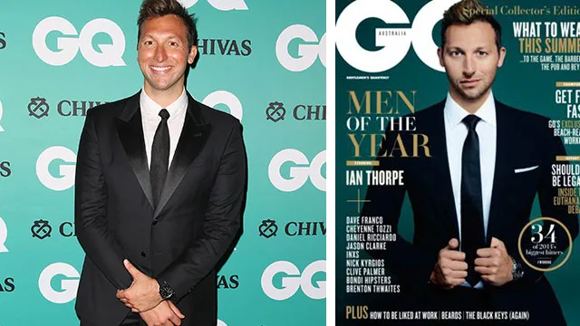 Ian Thorpe in a suit at a GQ event, next to his GQ Men of the Year magazine cover.