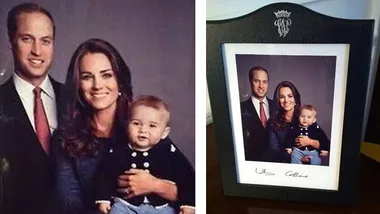 Family portrait of a couple and child in formal attire, displayed in a black frame with signatures below the photo.