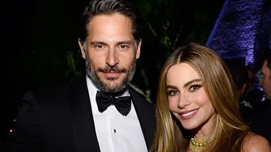 Sofia Vergara and Joe Manganiello smiling at an event in formal attire.