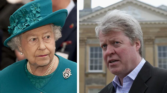 Senior royal figure in teal outfit alongside a man in a suit, outside a stately building.
