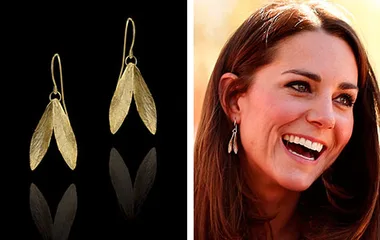 Pair of leaf-shaped gold earrings beside a woman smiling, wearing similar earrings.