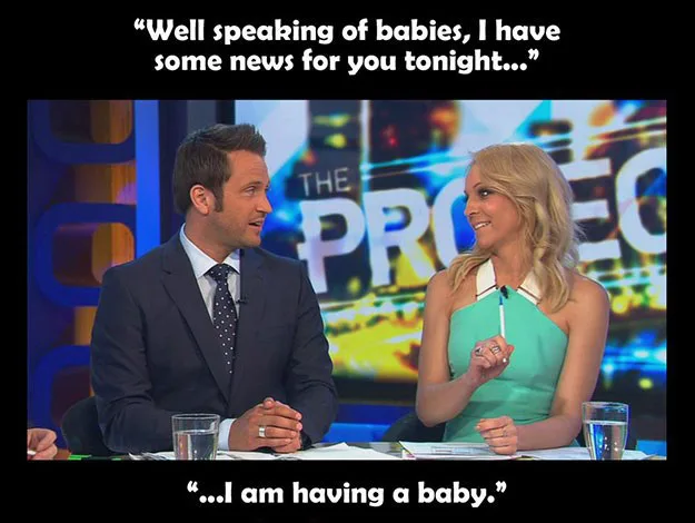 Two TV hosts smiling on a set with text overlay: "I'm having a baby," on a show labeled "The Project."