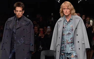 Ben Stiller and Owen Wilson on the runway as Derek Zoolander and Hansel at Paris Fashion Week, showcasing stylish outfits.