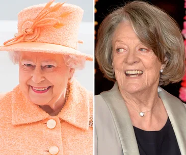 Two elderly women smiling, one in an orange outfit with a hat, the other in a formal suit with a necklace.
