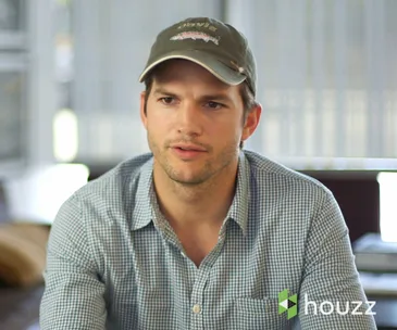 Man in a checkered shirt and cap, with Houzz logo in the corner.